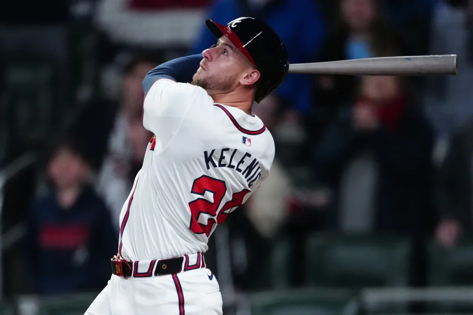 Atlanta Braves' Jarred Kelenic drives in a run with a double in the ninth inning of baseball game against the Arizona Diamondbacks Friday, April 5, 2024, in Atlanta. (AP Photo/John Bazemore)