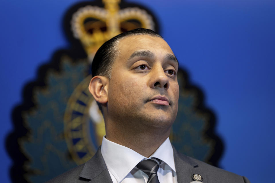 Superintendent Mandeep Mooker, Officer-in-Charge of IHIT listens to questions from media during a news conference for an update on the Hardeep Singh Nijjar homicide investigation from June 18, 2023, in Surrey, B.C., Friday, May 3, 2024. (Ethan Cairns/The Canadian Press via AP)