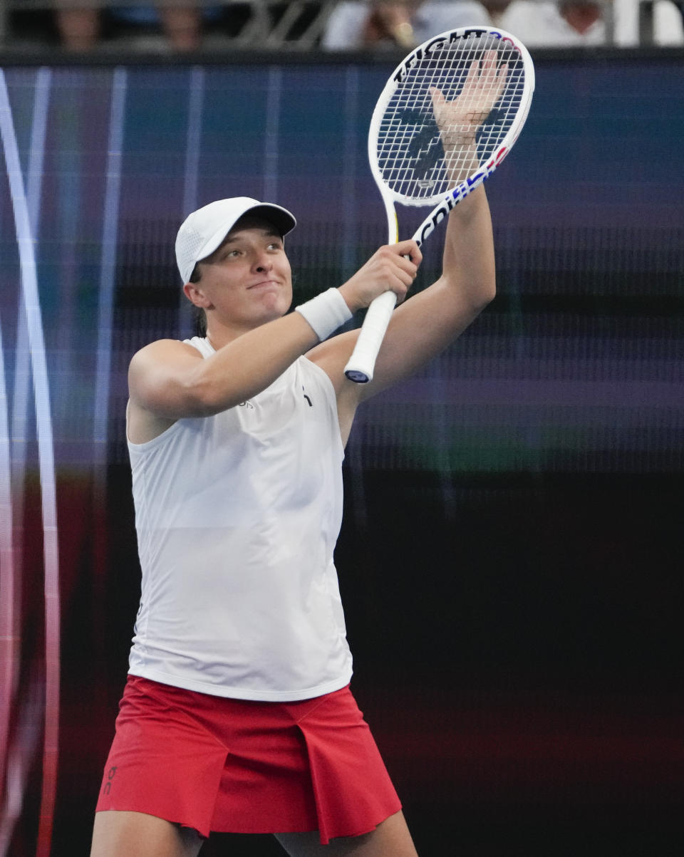 Poland's Iga Swiatek reacts after defeating Germany's Angelique Kerber in the final of the United Cup in Sydney, Australia, Sunday, Jan. 7, 2024. (AP Photo/Mark Baker)