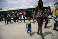 Haitians who were deported from the United States arrive at the Toussaint Louverture International Airport, in Port au Prince, Haiti, Sunday, Sep. 19, 2021. Thousands of Haitian migrants have been arriving to Del Rio, Texas, to ask for asylum in the U.S., as authorities begin to deported them to back to Haiti. (AP Photo/Rodrigo Abd)