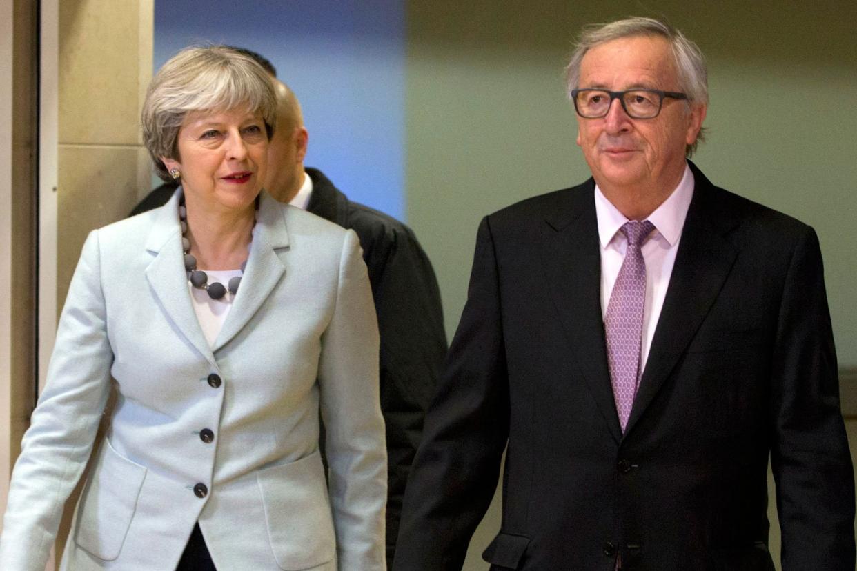 Theresa May and European Commission President Jean-Claude Juncker prior to the announcement of the Brexit deal: AP