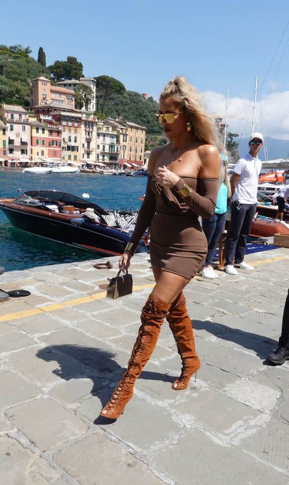 Khloé Kardashian Takes to the Streets of Italy in Lace-Up Knee