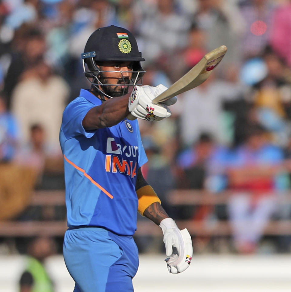 India's Lokesh Rahul celebrates after scoring fifty runs during the second one-day international cricket match between India and Australia in Rajkot, India, Friday, Jan. 17, 2020. (AP Photo/Ajit Solanki)