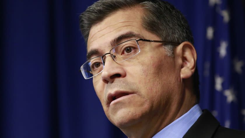 File - In this Feb. 20, 2018, file photo, California Attorney General Xavier Becerra discusses the need for bail reform, in Sacramento, Calif. Judges must consider suspects' ability to pay when they set bail amounts, Becerra said Tuesday, May 1, 2018, adding momentum to ongoing talks aimed at finding a better way to make sure suspects show up in court. Judges should only keep suspects in jail awaiting trial if they are dangerous or are likely to flee, Becerra said. (AP Photo/Rich Pedroncelli, File)