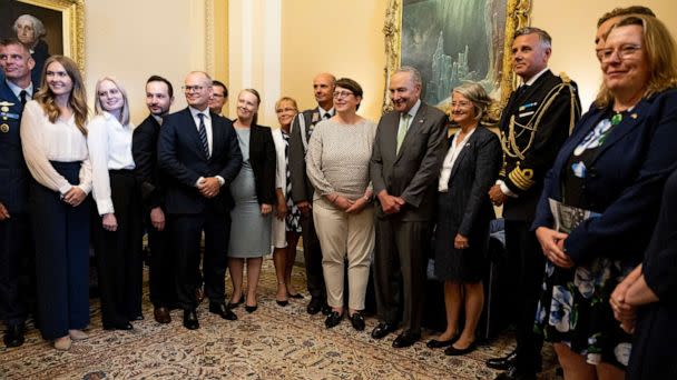 PHOTO: Senate Majority Leader Chuck Schumer poses for a photo with an official delegation from Finland and Sweden in his office in Washington, Aug. 3, 2022. (Anna Moneymaker/Getty Images)