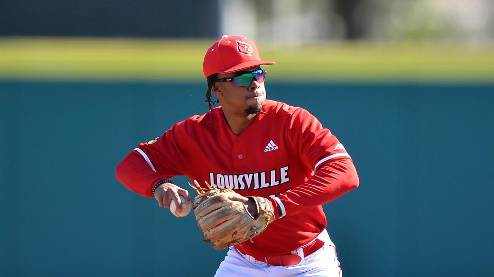 Louisville shortstop Noah Smith makes a throw during a non-conference baseball game against Connecticut.