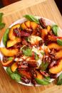 <p>We changed up the <a href="https://www.delish.com/cooking/recipe-ideas/a19695744/easy-caprese-salad-recipe/" rel="nofollow noopener" target="_blank" data-ylk="slk:classic caprese salad;elm:context_link;itc:0;sec:content-canvas" class="link ">classic caprese salad</a> by switching out juicy tomatoes for plump summer peaches and replacing sliced fresh mozzarella with its creamier cousin, burrata. Surrounded by fragrant basil then topped with <a href="https://www.delish.com/cooking/recipe-ideas/a34099585/candied-pecans-recipe/" rel="nofollow noopener" target="_blank" data-ylk="slk:candied pecans;elm:context_link;itc:0;sec:content-canvas" class="link ">candied pecans</a> and a drizzle of spicy honey, this sweet & savory salad is a STUNNER.</p><p>Get the <strong><a href="https://www.delish.com/cooking/recipe-ideas/a33472464/peach-and-burrata-caprese-recipe/" rel="nofollow noopener" target="_blank" data-ylk="slk:Peach & Burrata Caprese recipe;elm:context_link;itc:0;sec:content-canvas" class="link ">Peach & Burrata Caprese recipe</a></strong>.</p>