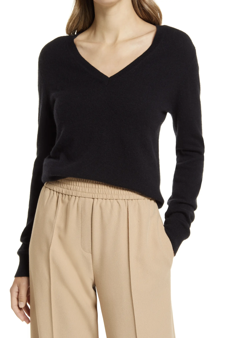 model wearing beige sweat pants and Cashmere Essential V-Neck Sweater in black (photo via Nordstrom)