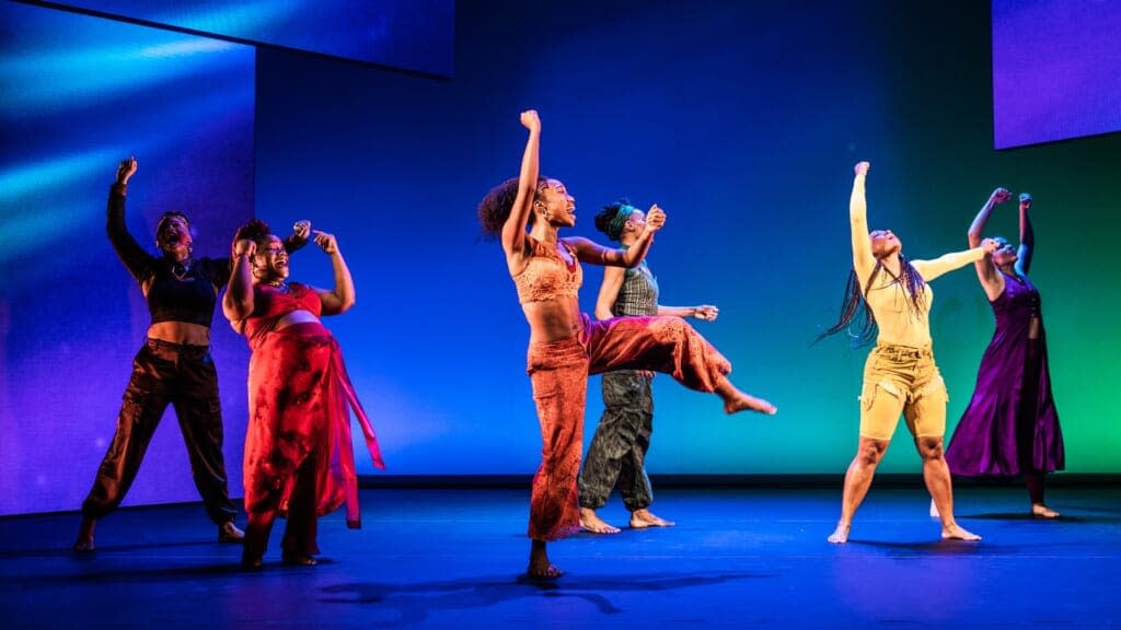 (L to R): Tendayi Kuumba (Lady in Brown), Kenita R. Miller (Lady in Red), Amara Granderson (Lady in Orange), Okwui Okpokwasili (Lady in Green), D. Woods (Lady in Yellow), Alexandria Wailes (Lady in Purple) in “for colored girls…” (Photo by Marc J. Franklin)