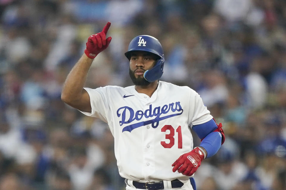 Los Angeles Dodgers' Amed Rosario celebrates his single against the Colorado Rockies during the third inning of a baseball game Friday, Aug. 11, 2023, in Los Angeles. (AP Photo/Ryan Sun)