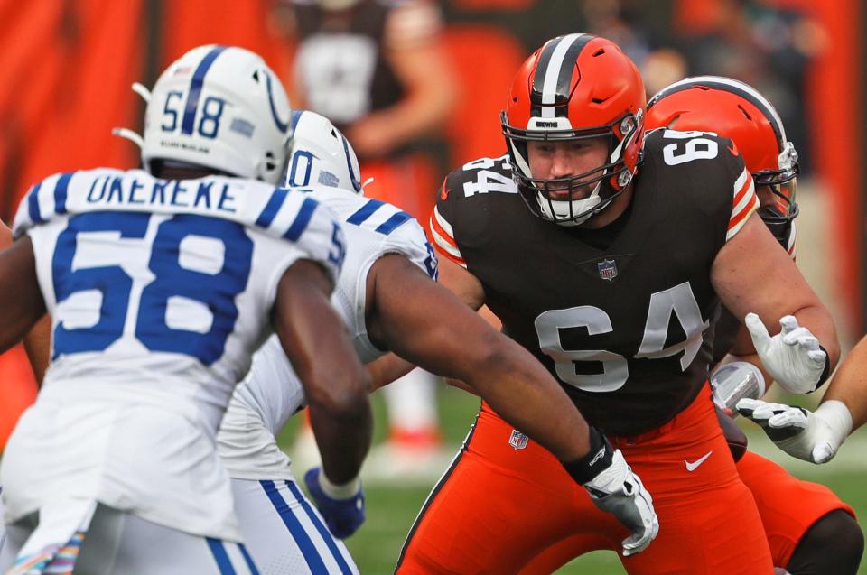 Browns center JC Tretter (64) blocks for Baker Mayfield during the first quarter against the Indianapolis Colts, Sunday, Oct. 11, 2020, in Cleveland, Ohio. [Jeff Lange/Beacon Journal]