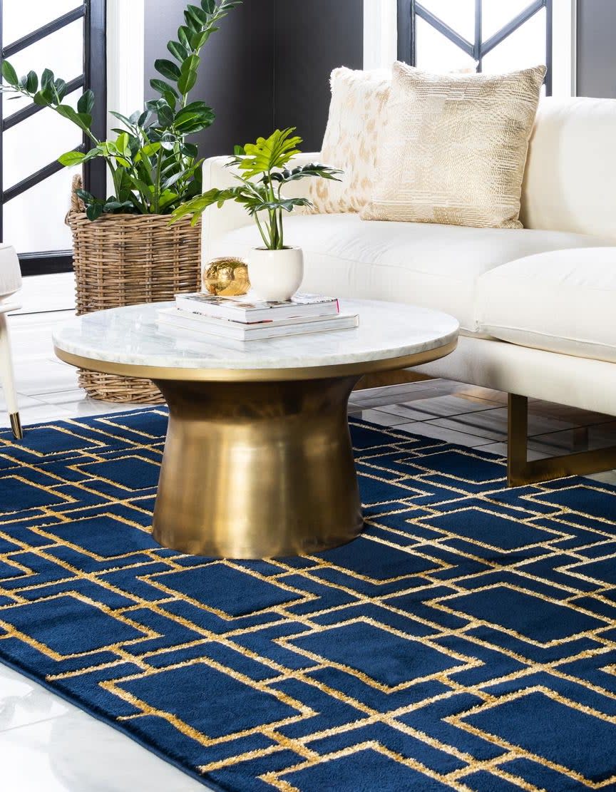 <p><a href="https://go.redirectingat.com?id=74968X1596630&url=https%3A%2F%2Frugs.com%2Fnavy-blue-gold-4x6-marilyn-monroe-area-rug-6284868&sref=https%3A%2F%2Fwww.housebeautiful.com%2Fshopping%2Fg60747561%2Fshop-and-tell-luxe-home-items-under-100%2F" rel="nofollow noopener" target="_blank" data-ylk="slk:Shop Now;elm:context_link;itc:0;sec:content-canvas" class="link rapid-noclick-resp">Shop Now</a></p><p>Marilyn Monroe Glam Deco Rug</p><p>rugs.com</p><p>$99.00</p>