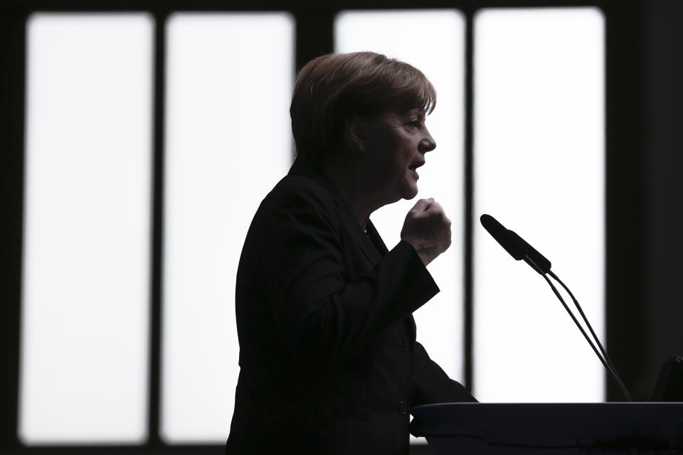 German Chancellor Angela Merkel delivers her keynote speech during the German ruling Christian Democratic Union party's convention ahead of the European Parliament elections in Berlin, Saturday, April 5, 2014. European Parliament elections are scheduled for May 2014. (AP Photo/Markus Schreiber)