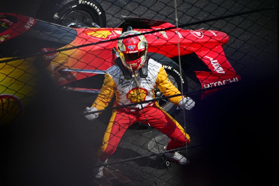 Indianapolis, Indiana, USA; Team Penske driver Josef Newgarden (2) celebrates after winning the 107th running of the Indianapolis 500 at Indianapolis Motor Speedway.