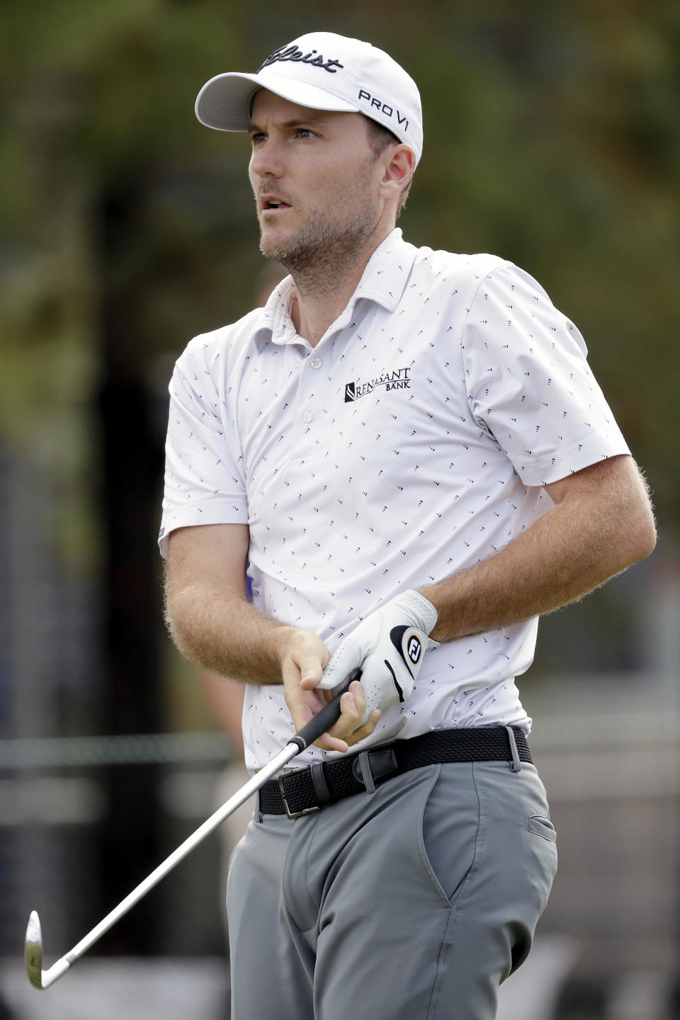 Russell Henley watches his tee shot on the ninth hole during the first round of the Houston Open golf tournament Thursday, Nov., 11, 2021, in Houston. (AP Photo/Michael Wyke)