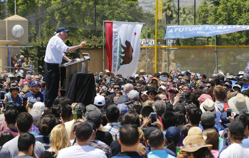 FILE - In this May 25, 2016 file photo, Democratic presidential candidate Sen. Bernie Sanders, I-Vt., speaks during a campaign rally in Cathedral City, Calif. By the time California's presidential primary finally arrived in 2016, Sanders was a beaten man. This time around, everything has changed. Sanders arrives in California this week for rallies in San Diego, Los Angeles and San Francisco with the state's vast trove of delegates in play for 2020, no front-runner in a crowded Democratic presidential field and a left-leaning electorate looking favorably on his signature proposals. (AP Photo/Damian Dovarganes, File)