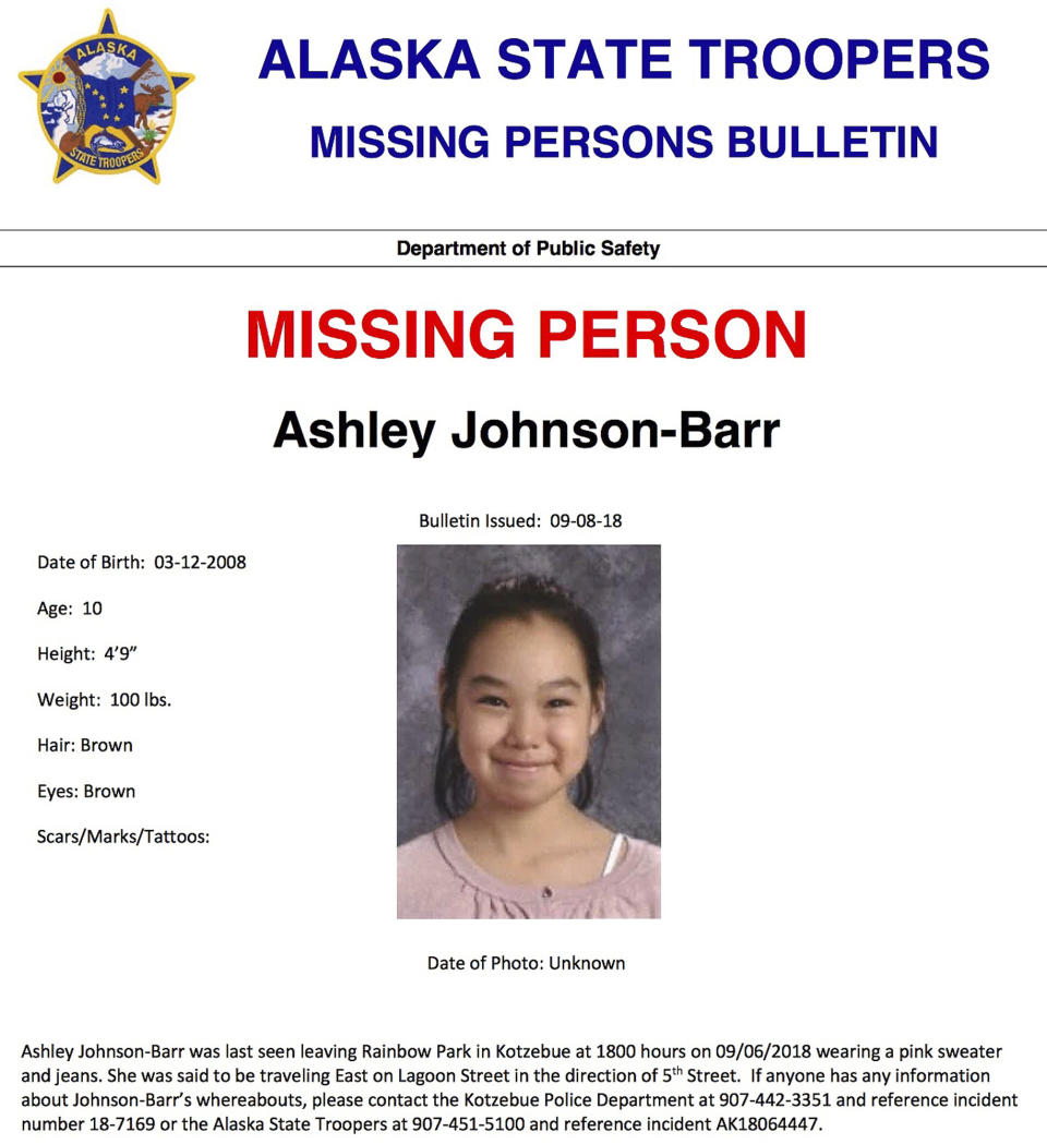 This missing person poster released by Alaska State Troopers shows Ashley Johnson-Barr, who was last seen leaving Rainbow Park in Kotzebue, Alaska, on Sept. 6, 2018, wearing a pink sweater and jeans. A search that includes multiple FBI agents has yielded no sign of Johnson-Barr, who went missing in a remote, largely Inupiat Eskimo town north of the Arctic Circle on Alaska’s western coast. Now authorities are investigating whether foul play was involved. (Alaska State Troopers via AP)