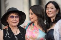 <p>Lucy Liu grew up in Queens, New York City with her sister, Jenny. The actress was joined by her older sister during her Hollywood Walk of Fame tribute, and the family resemblance is visible.</p>