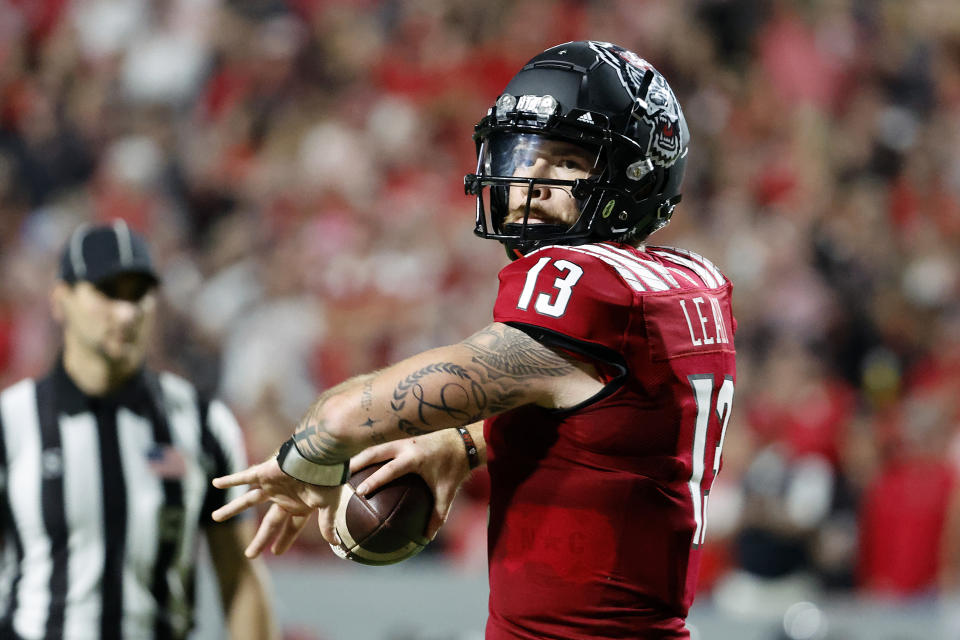 North Carolina State's Devin Leary (13) prepares to throw the ball during the first half of an NCAA college football game against Connecticut in Raleigh, N.C., Saturday, Sept. 24, 2022. (AP Photo/Karl B DeBlaker)