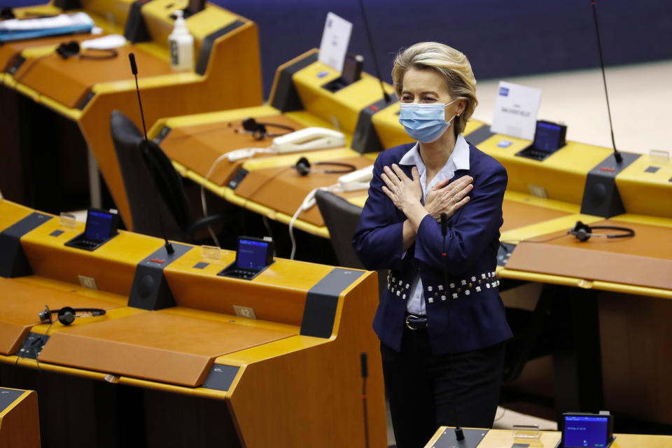 European Commission President Ursula von der Leyen gestures prior to a plenary session at the European Parliament in Brussels, Wednesday, Dec. 16, 2020. Von der Leyen said Wednesday she saw clear progress in the trade talks with the UK, turning a post-Brexit deal from a fleeting possibility into an ever more realistic possibility. (AP Photo/Francisco Seco)
