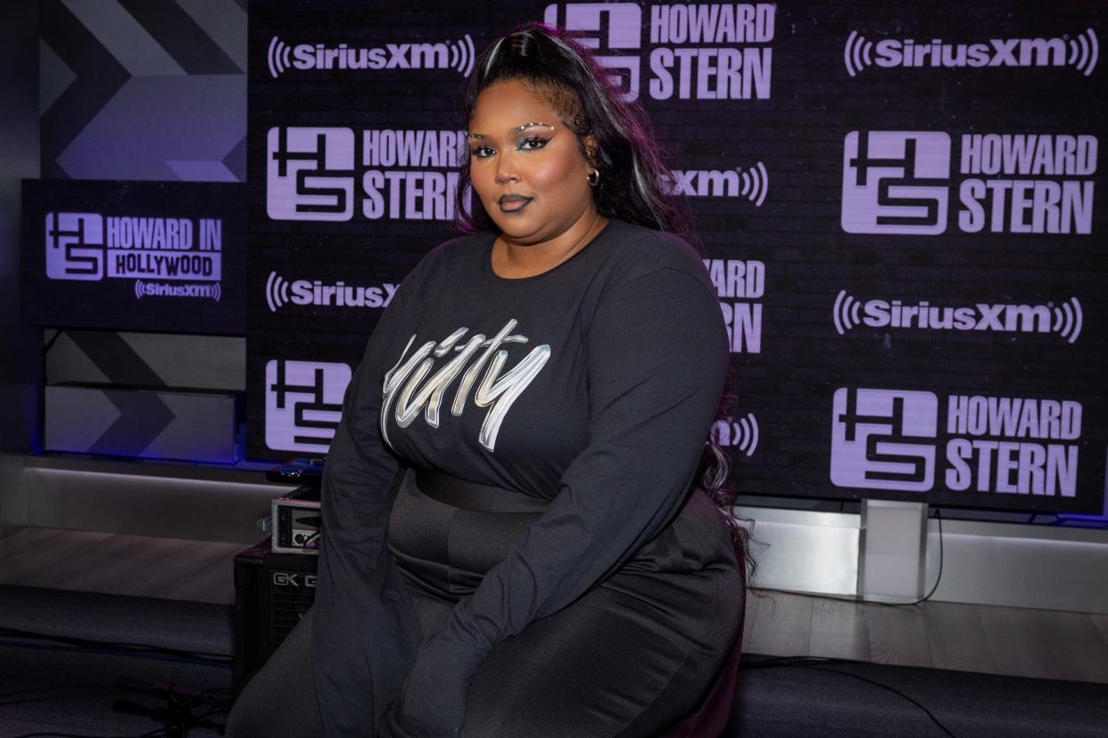 Lizzo visits SiriusXM's 'The Howard Stern Show' at SiriusXM Studios on December 12, 2022 in Los Angeles, California.