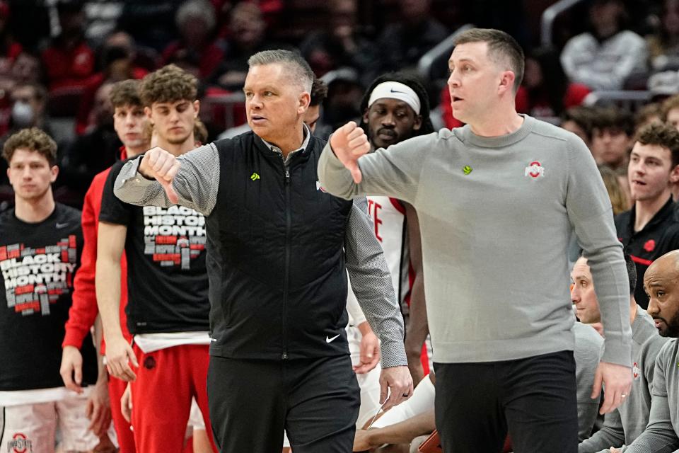 Feb 9, 2023; Columbus, OH, USA;  Ohio State Buckeyes head coach Chris Holtmann and assistant Jake Diebler motion a play during the first half of the NCAA men’s basketball game against the Northwestern Wildcats at Value City Arena. Mandatory Credit: Adam Cairns-The Columbus Dispatch