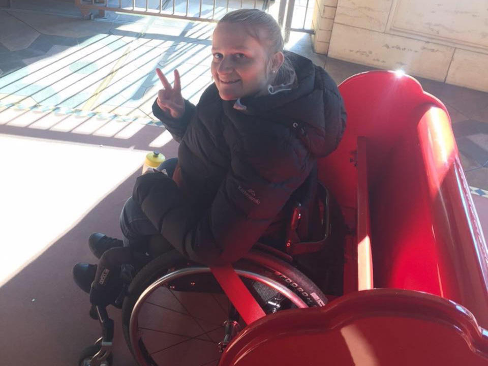 Kate Swain, pictured here enjoying a wheelchair accessible merry-go-round in Tokyo, said Bondi should be accessible for everyone. Image: Supplied