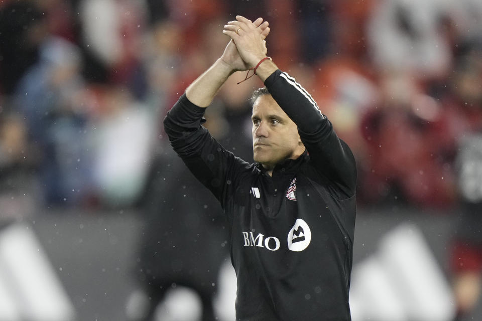 Toronto FC coach John Herdman thanks the fans after the team's MLS soccer match against New York City FC on Saturday, May 11, 2024, in Toronto. (Frank Gunn/The Canadian Press via AP)