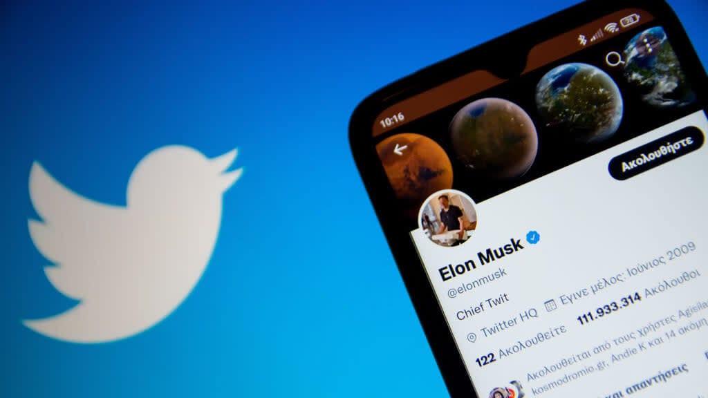 In this photo illustration Elon Musk Twitter seen displayed on a smartphone screen with Twitter logo in the background in Athens, Greece on October 30, 2022. (Photo by Nikolas Kokovlis/NurPhoto via Getty Images)