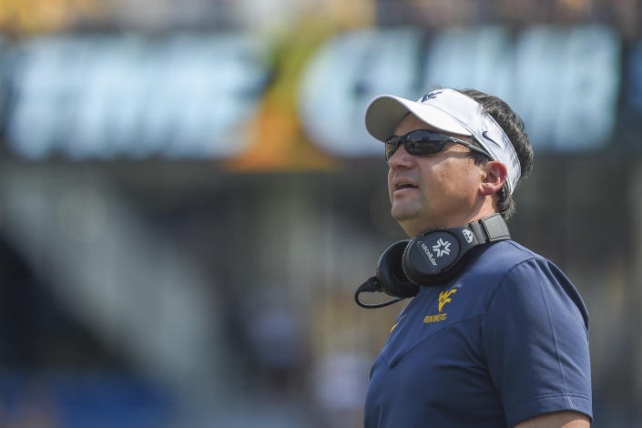 West Virginia head coach Neal Brown looks o during the first half of an NCAA college football game against Towson in Morgantown, W.Va., Saturday, Sept. 17, 2022. (AP Photo/William Wotring)