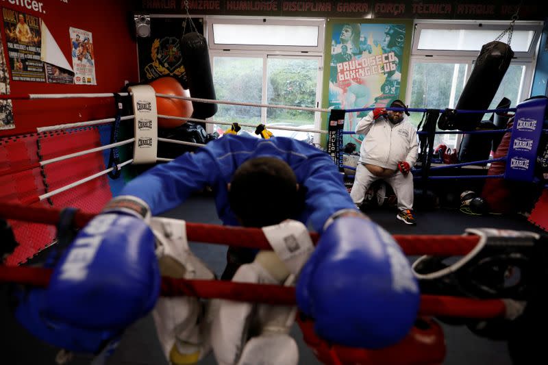 Boxer Farid Walizadeh rests during a training session in Lisbon