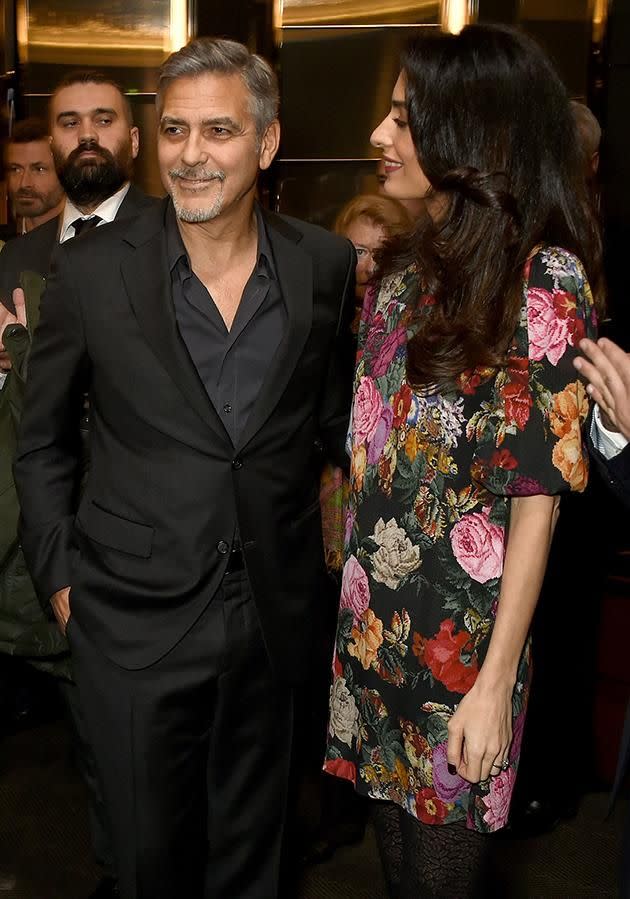 Amal lovingly glanced at her husband throughout the night. Photo: Getty.