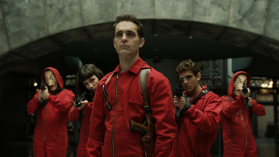 Berlin stands among armed gunmen in "Money Heist"