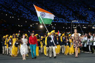 <b>Madhura makes her 'mark':</b> During the Parade of Nations, an unknown woman was seen at the front of the Indian contingent wearing a tracksuit instead of the officially sanctioned national uniform for the event. The acting Chef-de-Mission for the Indian contignent Brigadier PK Muralidharan Raja expressed anger at the LOCOG for allowing this to happen despite security personnel checking the identity of athletes and staff before entering the stadium. <br><br> The Indian media subsequently identified the woman as Madhura Nagendra, a graduate student from Bangalore living in London and a dancer in another segment of the opening ceremony.<br><br> <a href="http://in.news.yahoo.com/olympics--olympics--intruder-in-indian-contingent.html " data-ylk="slk:Intruder in Indian contingent;elm:context_link;itc:0;sec:content-canvas;outcm:mb_qualified_link;_E:mb_qualified_link;ct:story;" class="link  yahoo-link">Intruder in Indian contingent</a><br> <a href="http://in.news.yahoo.com/locog-apologises-india-opening-ceremony-incident-081850891.html " data-ylk="slk:LOCOG apologises to India;elm:context_link;itc:0;sec:content-canvas;outcm:mb_qualified_link;_E:mb_qualified_link;ct:story;" class="link  yahoo-link">LOCOG apologises to India</a><br> <a href="http://in.news.yahoo.com/photos/gatecrasher-madhura-strikes-again-slideshow/ " data-ylk="slk:Gatecrasher Madhura strikes again;elm:context_link;itc:0;sec:content-canvas;outcm:mb_qualified_link;_E:mb_qualified_link;ct:story;" class="link  yahoo-link">Gatecrasher Madhura strikes again</a><br> <a href="http://in.news.yahoo.com/mystery-woman-gatecrashed-india-march-past-report-063656992--spt.html " data-ylk="slk:India gatecrasher identified;elm:context_link;itc:0;sec:content-canvas;outcm:mb_qualified_link;_E:mb_qualified_link;ct:story;" class="link  yahoo-link">India gatecrasher identified</a>