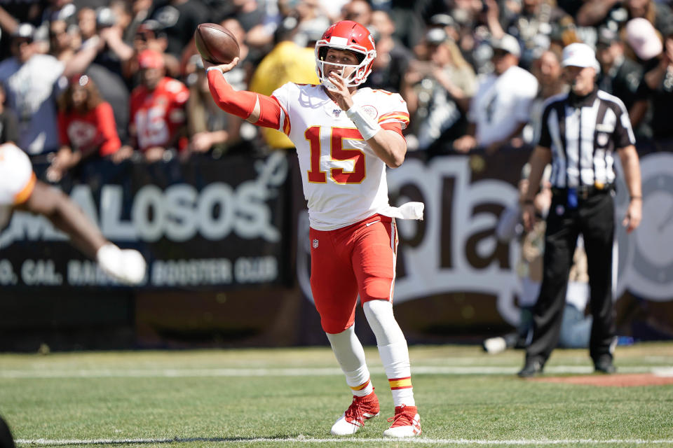 Sep 15, 2019; Oakland, CA, USA; Kansas City Chiefs quarterback Patrick Mahomes (15) throws the football against the against the Oakland Raiders during the second quarter at the Oakland Coliseum. Mandatory Credit: Stan Szeto-USA TODAY Sports