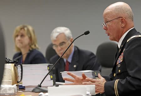 Army Col. Neil Page (R) testifies before the Virginia Board of Medicine regarding the medical practices of Dr John Henry Hagmann, in Richmond, Virginia June 19, 2015. REUTERS/Jay Paul