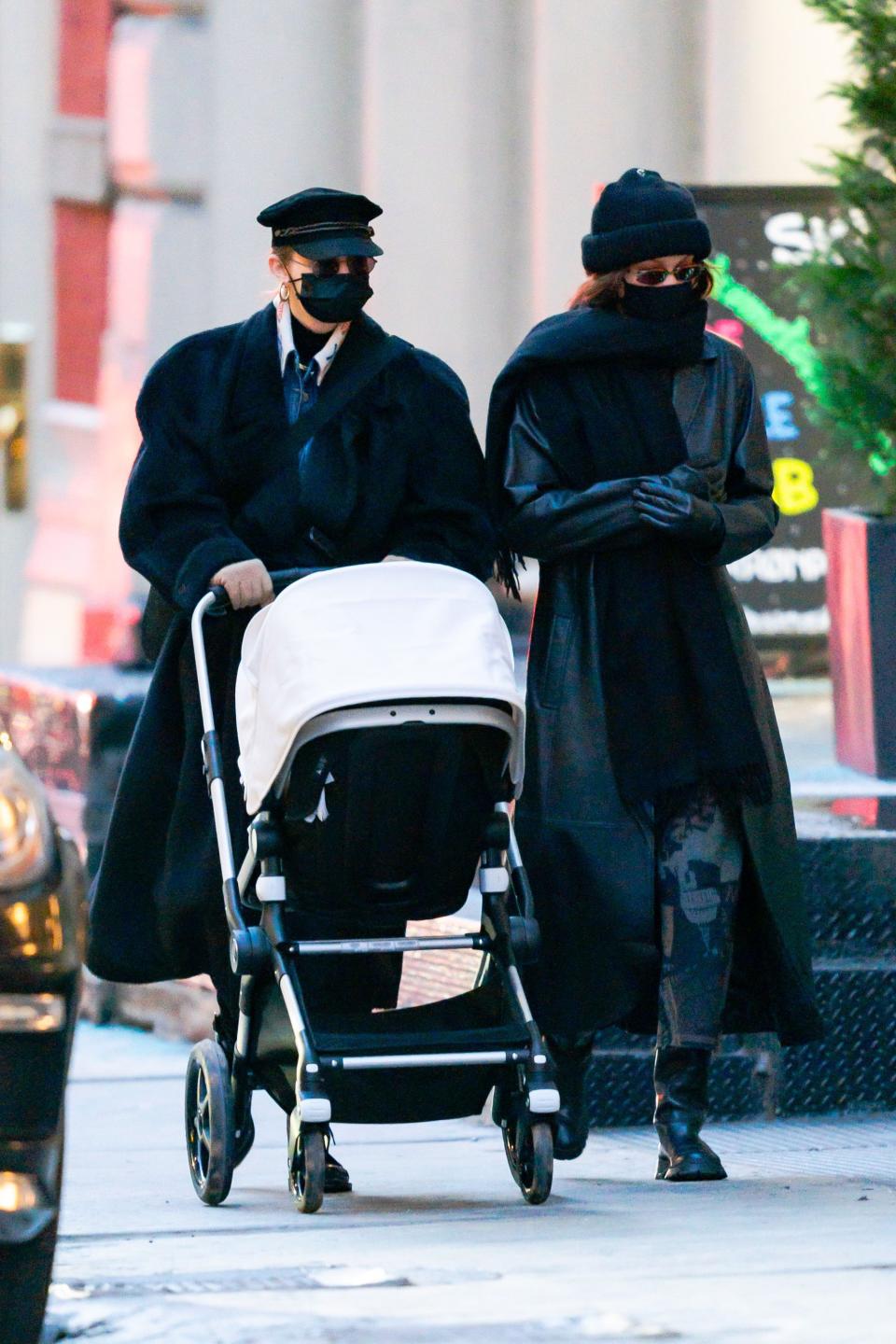 The model was pictured in December walking in New York with her older sister Gigi Hadid and her daughter Khai in a pram. (Getty Images)