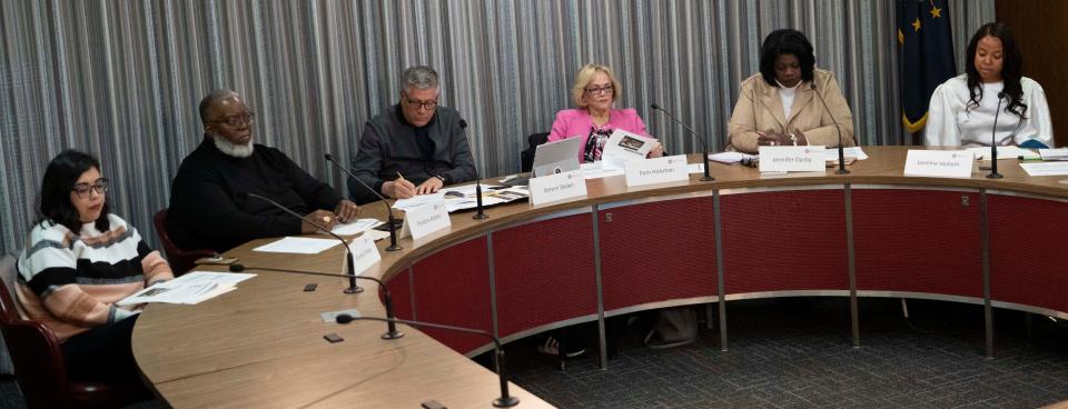 Members of the Indianapolis Charter School Board convene during a replication meeting concerning a vote to approve two new charter high schools in Pike Township Tuesday, Nov. 15, 2022, at the City Council Building in Indianapolis.