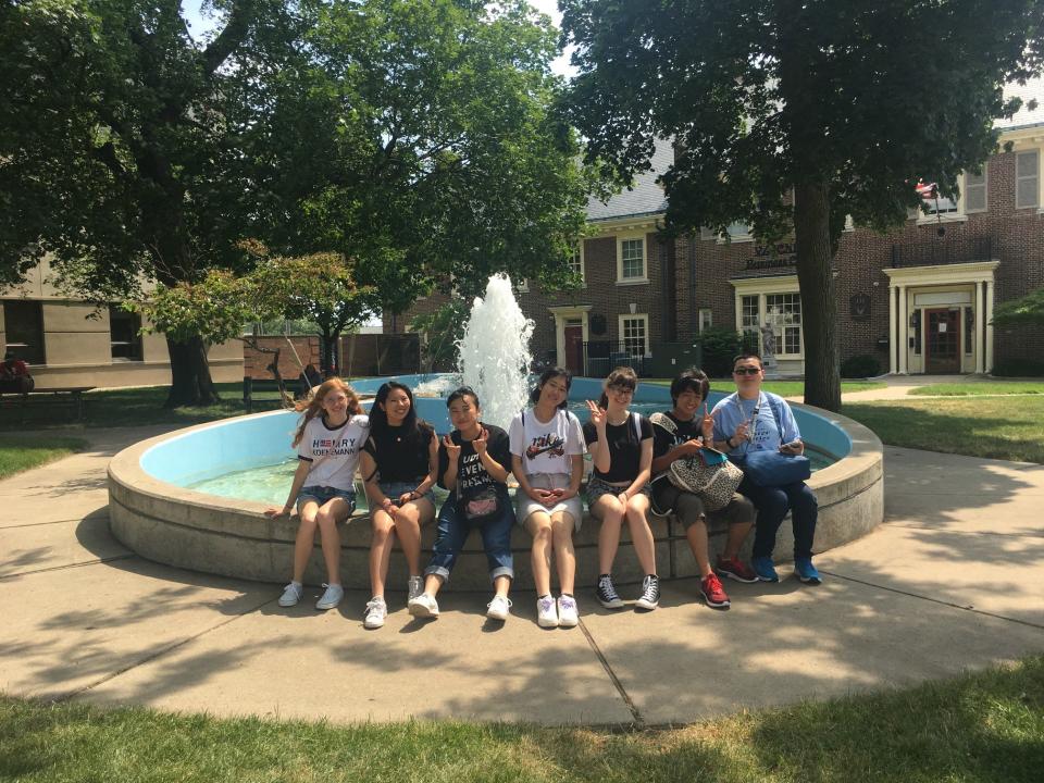 Students from Hofu, Japan, are shown at the Lotus Fountain in downtown Monroe.