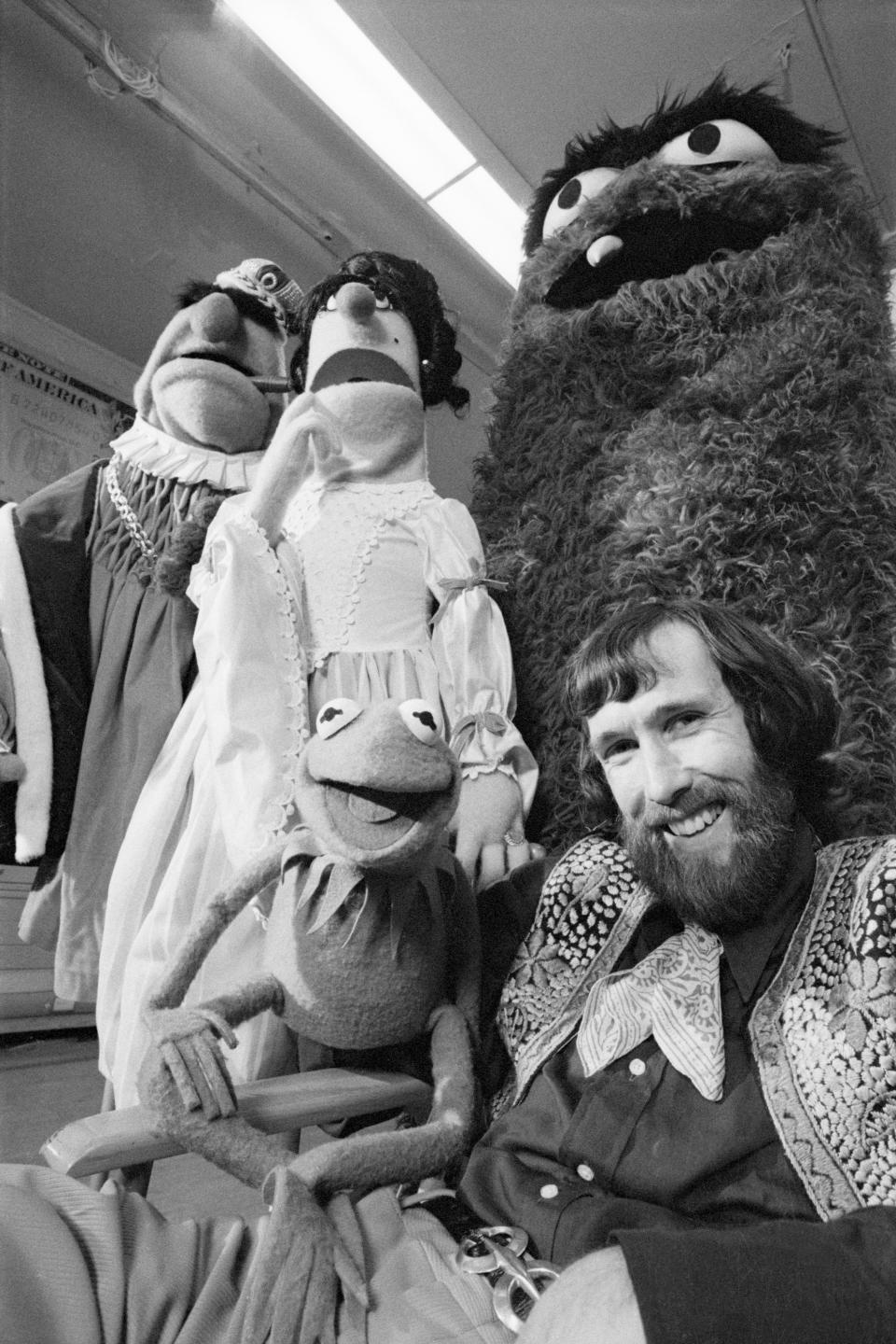 Jim Henson poses with a few of his Muppet creations, who became a major factor in the success of the <em>Sesame Street</em> series.