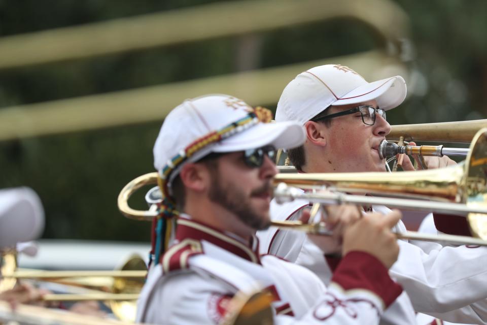 Florida State University held its annual homecoming parade through the streets of Tallahassee Friday, Oct. 19, 2018. The Marching Chiefs play as Florida State University holds its annual homecoming parade through the streets of Tallahassee Friday, Oct. 19, 2018. 