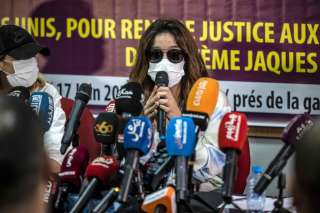 An accuser speaks during a press conference organised by the Moroccan Association for the Rights of Victims in Tangiers in northern Morocco on June 17, 2022, regarding the trial of Jacques Bouthier, the French former CEO of the Vilavi group who was charged with human trafficking and rape of a minor in a case that has shocked France. - Bouthier, 75, was charged after a woman, 22, went to the Paris police in March and said he had held her captive for five years and repeatedly raped her, a source close to the case, who asked not to be named, told AFP. (Photo by FADEL SENNA / AFP) (Photo by FADEL SENNA/AFP via Getty Images)