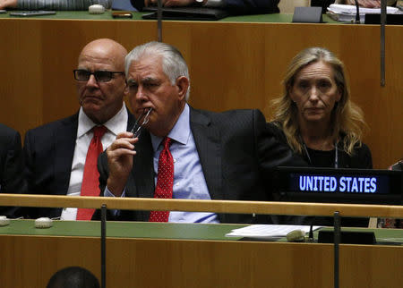 U.S. Secretary of State Rex Tillerson listens as U.S. President Donald Trump addresses the General Assembly. REUTERS/Brendan McDermid