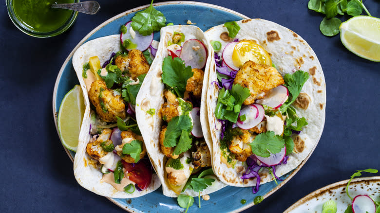 Overview of cauliflower tacos on plate 