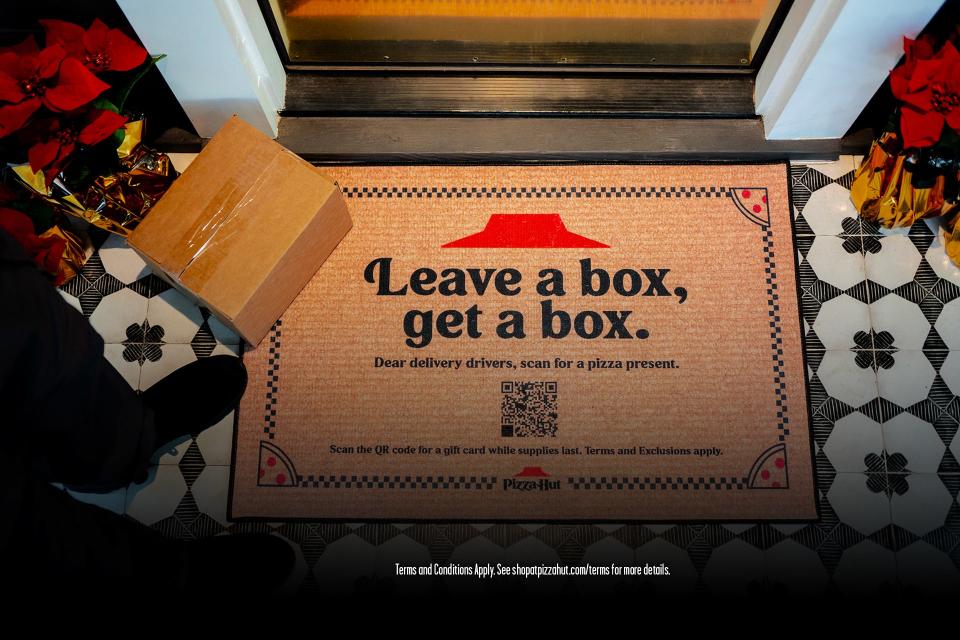 Pizza Hut's Reverse Delivery doormat has a bar code delivery drivers can scan to earn a free box of pizza.