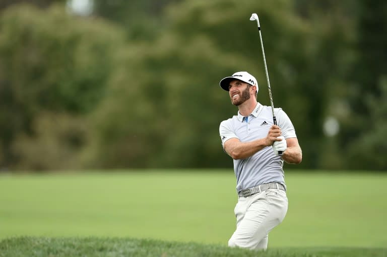 Dustin Johnson of the US hits his approach shot on the 18th hole during the second round of the BMW Championship, at Crooked Stick Golf Club in Carmel, Indiana, on September 9, 2016