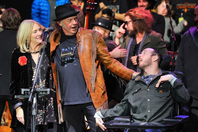 <p>Steve Jennings/WireImage</p> Pegi Young, Neil Young and Ben Young attend the 30th Annual Bridge School Benefit concert on October 22, 2016, in Mountain View, California.