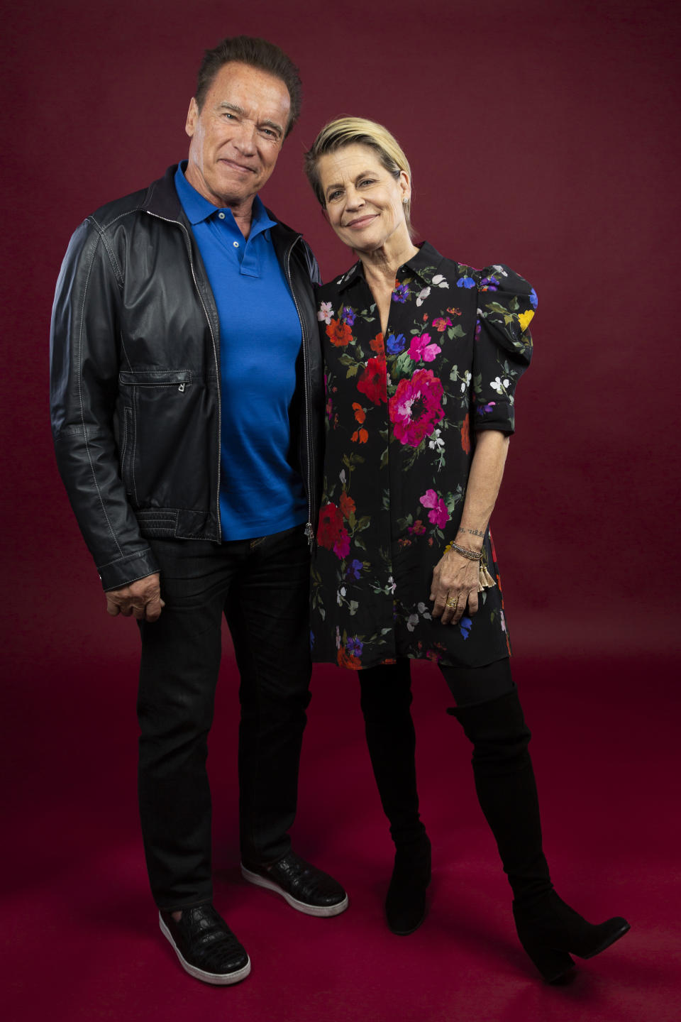 This Oct. 26, 2019 photo shows actor Arnold Schwarzenegger, left, and actress Linda Hamilton posing for a portrait to promote the film, "Terminator: Dark Fate" at the Four Seasons Hotel Los Angeles at Beverly Hills in Los Angeles. (Photo by Willy Sanjuan/Invision/AP)