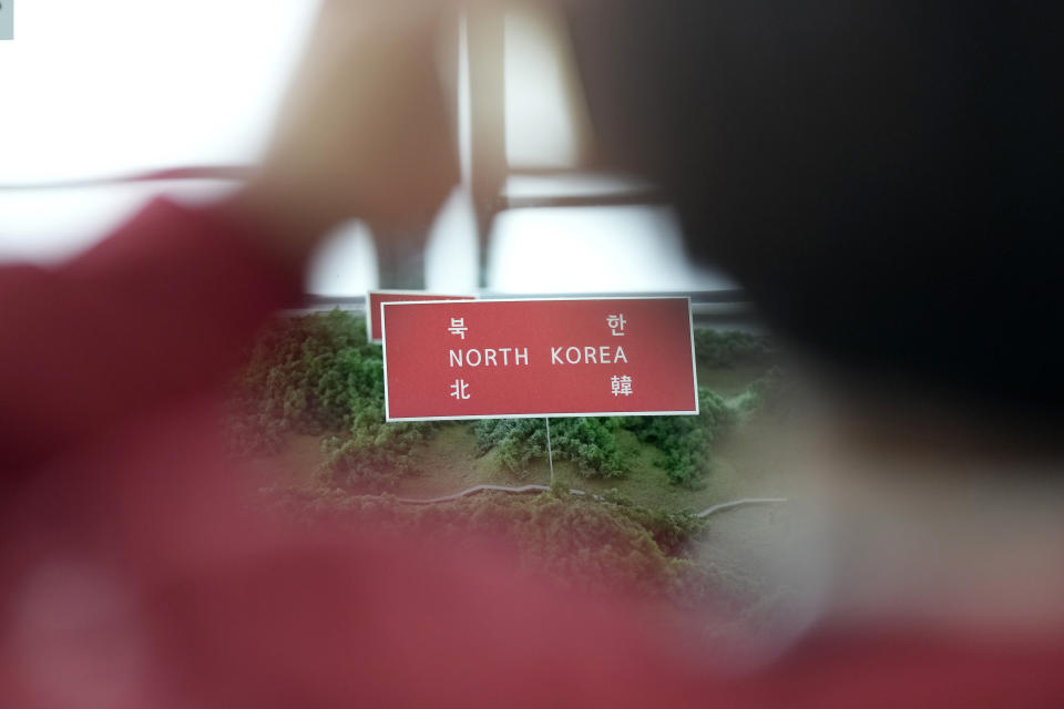 FILE - A sign of North Korea is seen on a map at the unification observatory in Paju, South Korea, on Nov. 22, 2023. South Korea’s Joint Chiefs of Staff says North Korea fired 200 rounds in the waters north of their disputed western sea boundary on Friday, Jan. 5, 2024. (AP Photo/Lee Jin-man, File)