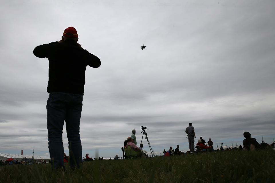 Aviation enthusiasts attend the The Royal International Air Tattoo at the RAF in Fairford